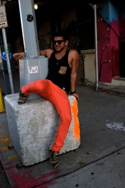 orange pants black shirt