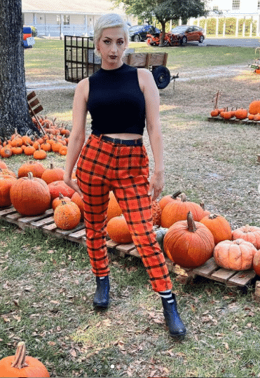 Orange pants with black shirt