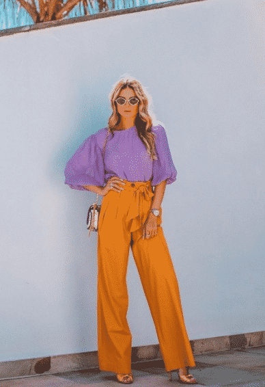 Orange pants with lilac shirt