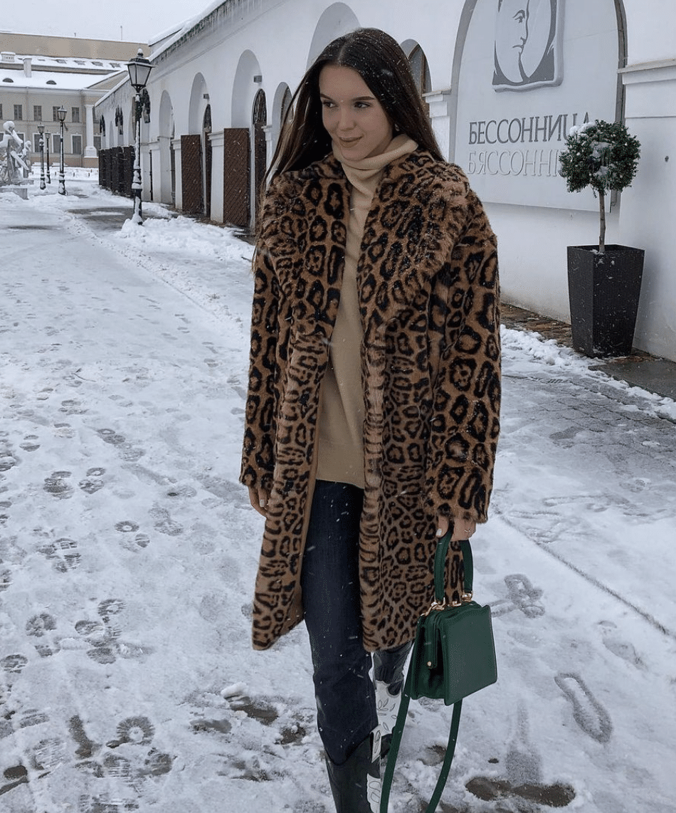 animal print jacket ski trip outfit