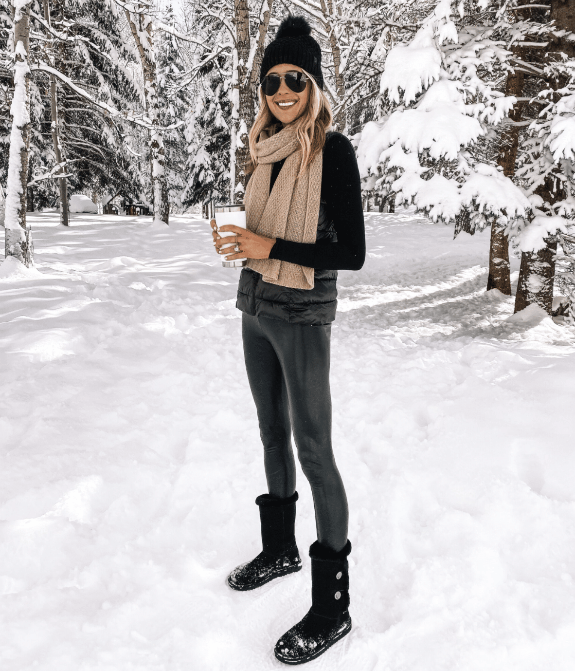 black vest and skarf ski trip outfit