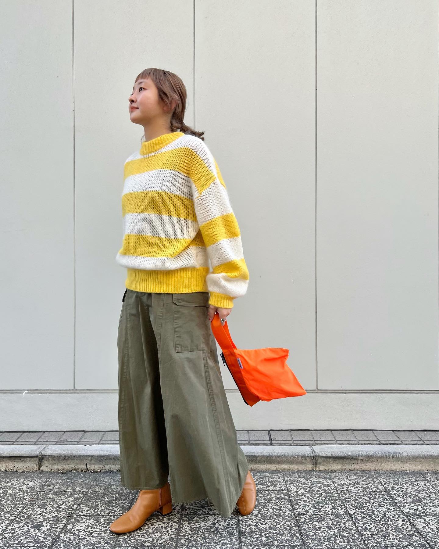 Pair A Stripped Sweater With A Long Skirt For A Relaxed Streetstyle Effect