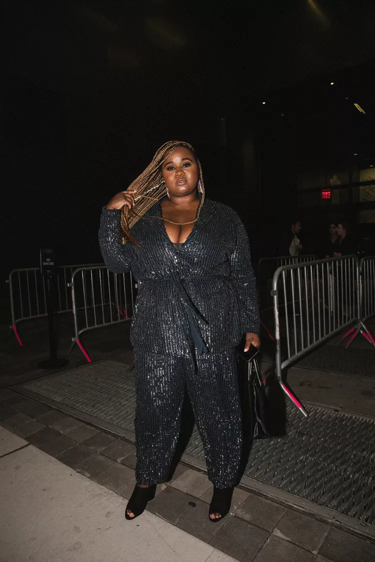 Plus size outfit ideas. Black jumpsuit. Louis Vuitton.