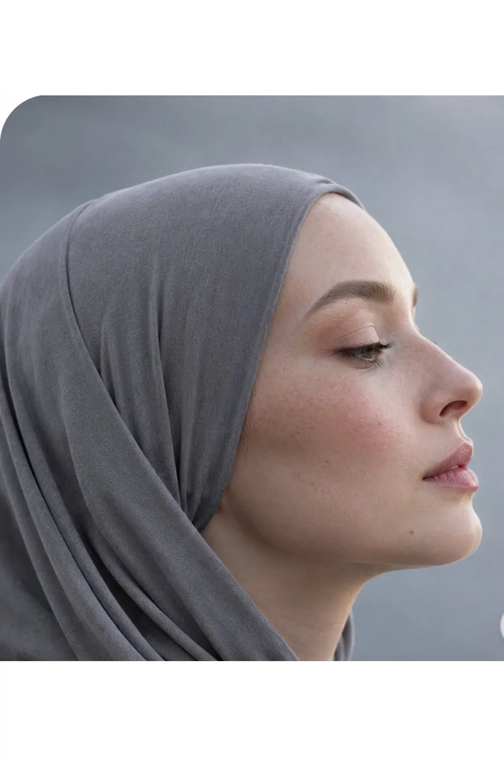 Pink lips makeup look with grey jersey hijab