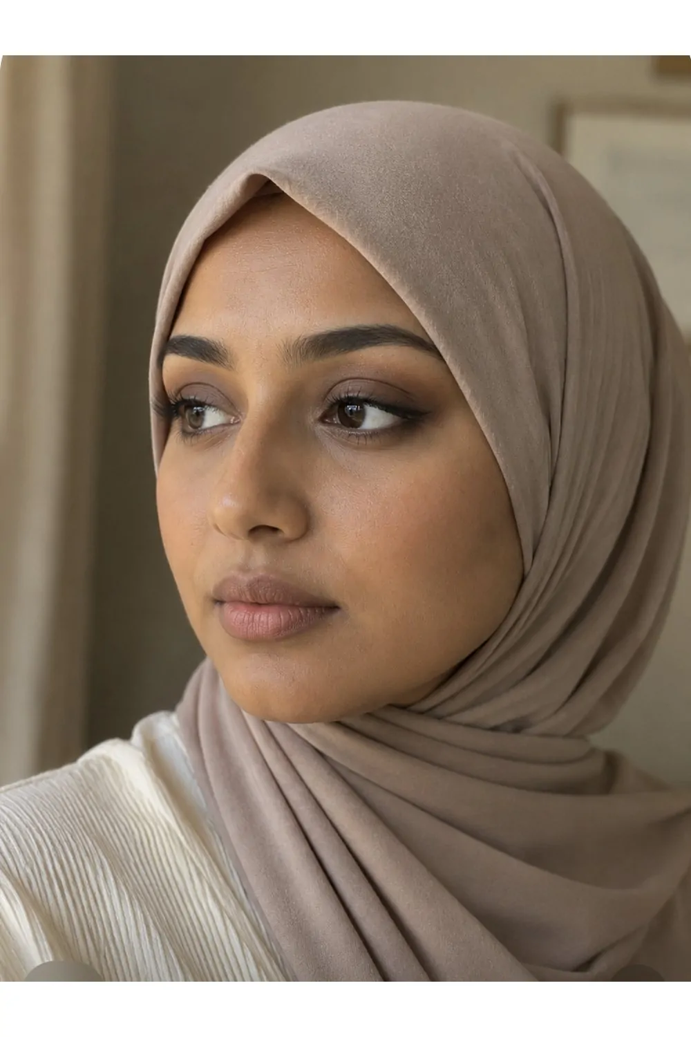 Smoky eyes makeup look with nude hijab