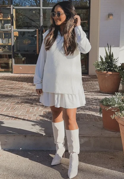 Pair A Vest With A White Shirt Dress And Matching White Boots