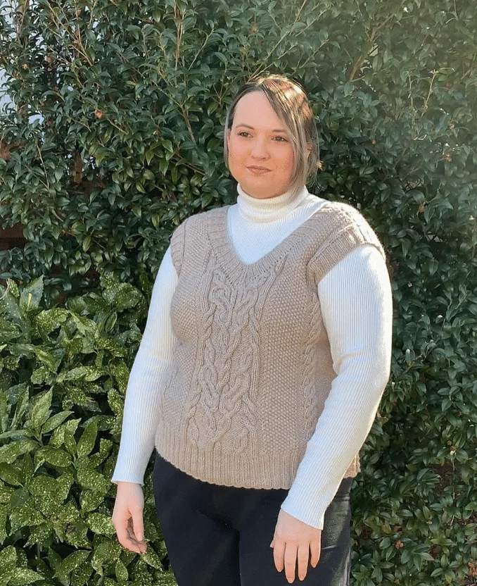 With A White Turtleneck And Black Pants