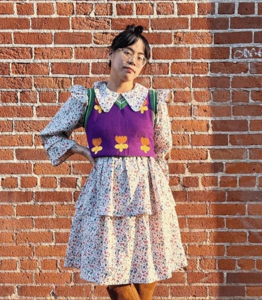 Pair A Floral Summer Dress With A Purple Vest