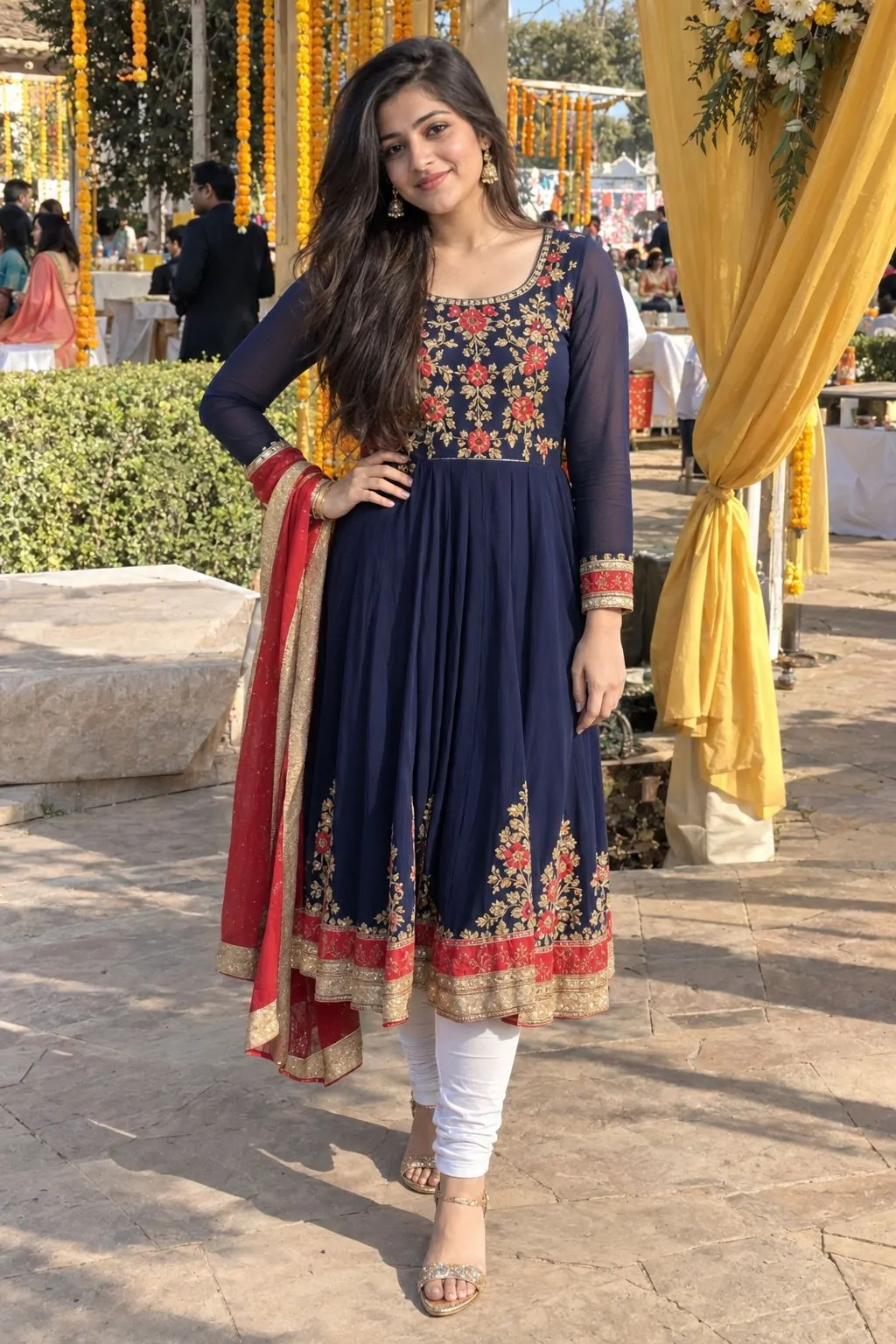 Navy blue anarkali with floral embroidery styled with white chori dar